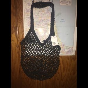 NWT H&M black netted shoulder bag.